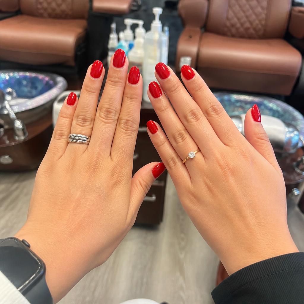 Matching red manicures from a sister mani date